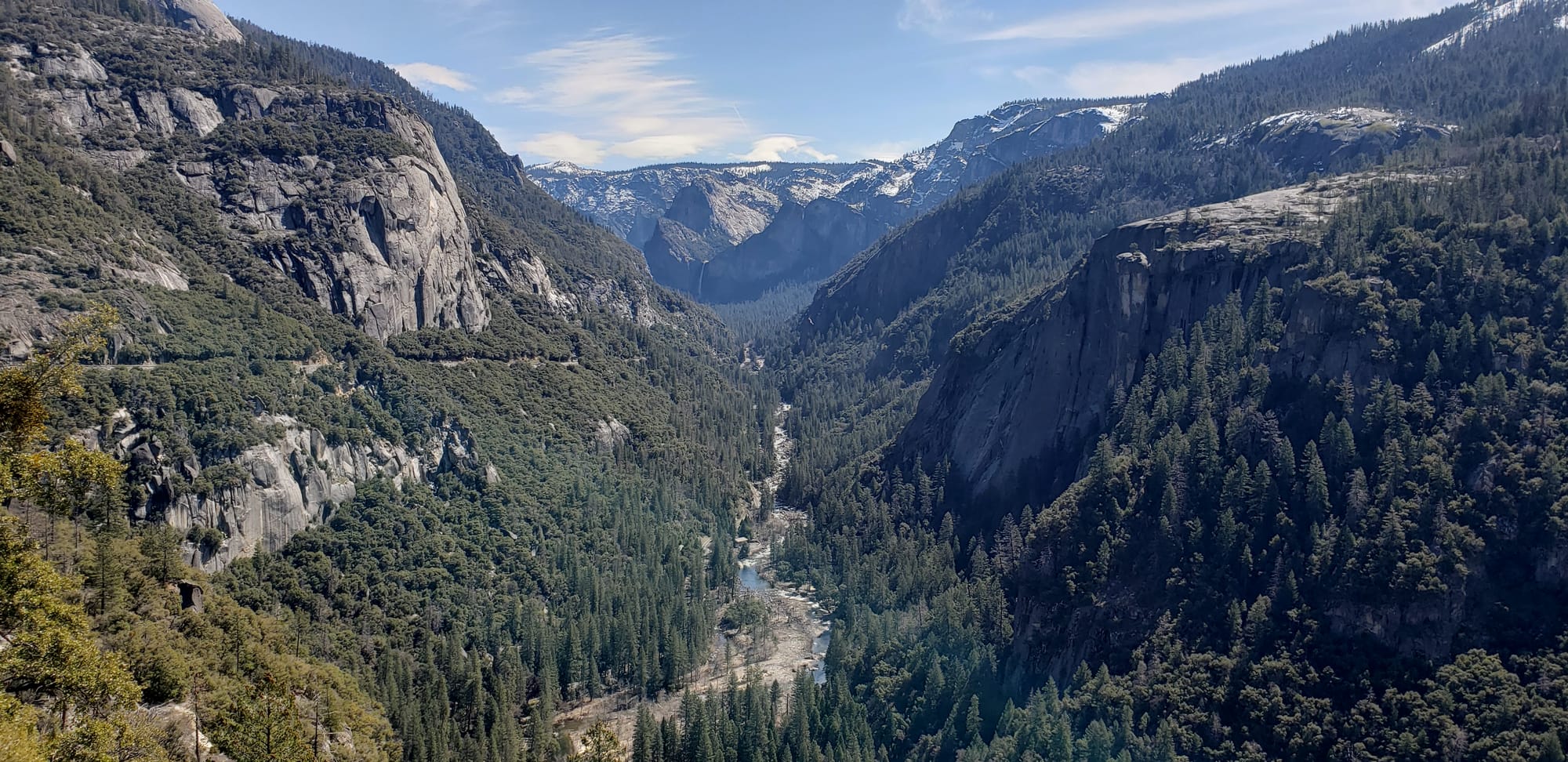 Highway 140 climbing the Merced River canyon toward Arch Rock, the all-weather road into the Valley